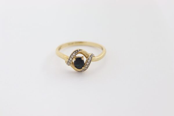 feiner Ring  mit Diamant und Saphir – Bild 2