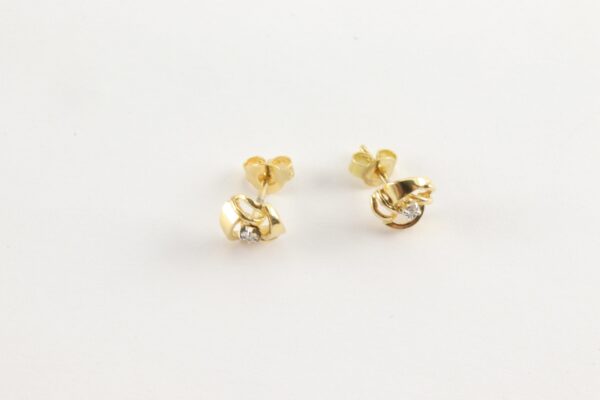 besonders schöne Ohrstecker in Gelbgold mit Diamant – Bild 2