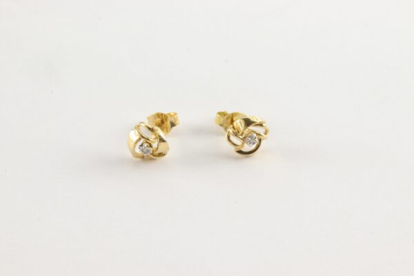 besonders schöne Ohrstecker in Gelbgold mit Diamant – Bild 4