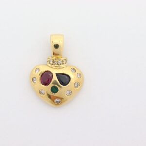 Anhänger in Gelbgold  mit Diamanten / Rubin