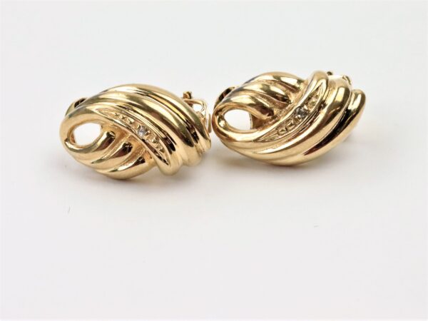 feine Ohrclip in Gelbgold mit Diamant – Bild 5