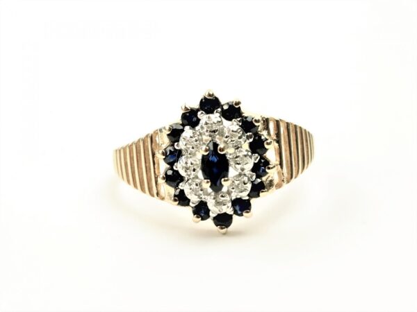 Ring in Gelbgold mit 6 Diamanten und Saphir