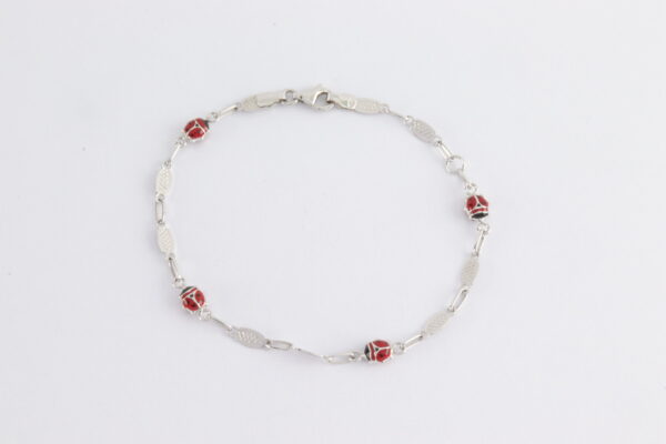 Armband in Weißgold mit Marienkäfer